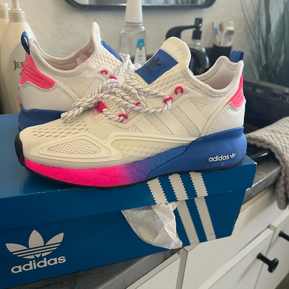 Brand new never worn Adidas. Tags still on in original box.